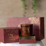 Scented candle in a decorative glass jar ليمون جراس - شمعة