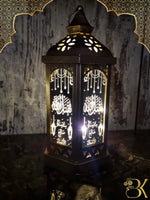 Metal and glass Ramadan lantern for festive home decoration فانوس رمضان مصنوع من المعدن والزجاج